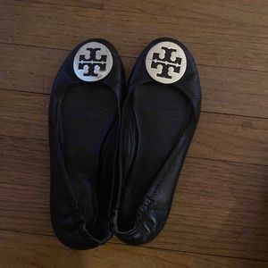 Lightly worn classic Tory Burch ballet flats. Black leather with gold emblem.